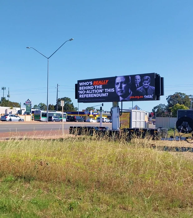Roadside trailer-mounted LED billboard displaying a referendum campaign advertisement